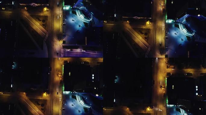 梦幻般的夜间天际线，有照明的摩天大楼。视频。市中心的景色。色彩丰富的旅行背景