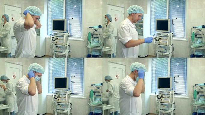 护士在手术室洗手时，男医生戴上手术帽