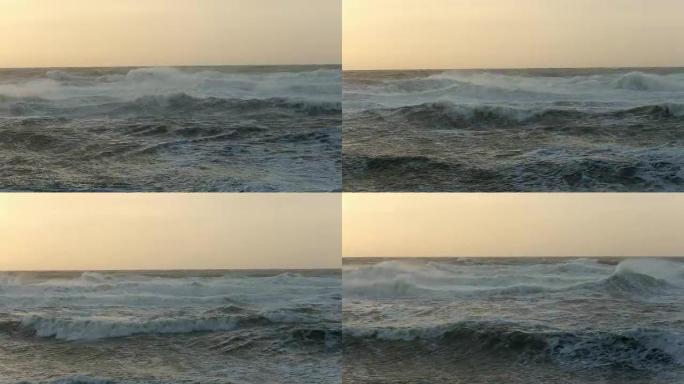 Ocean waves coming up on the shore. Beautiful suns