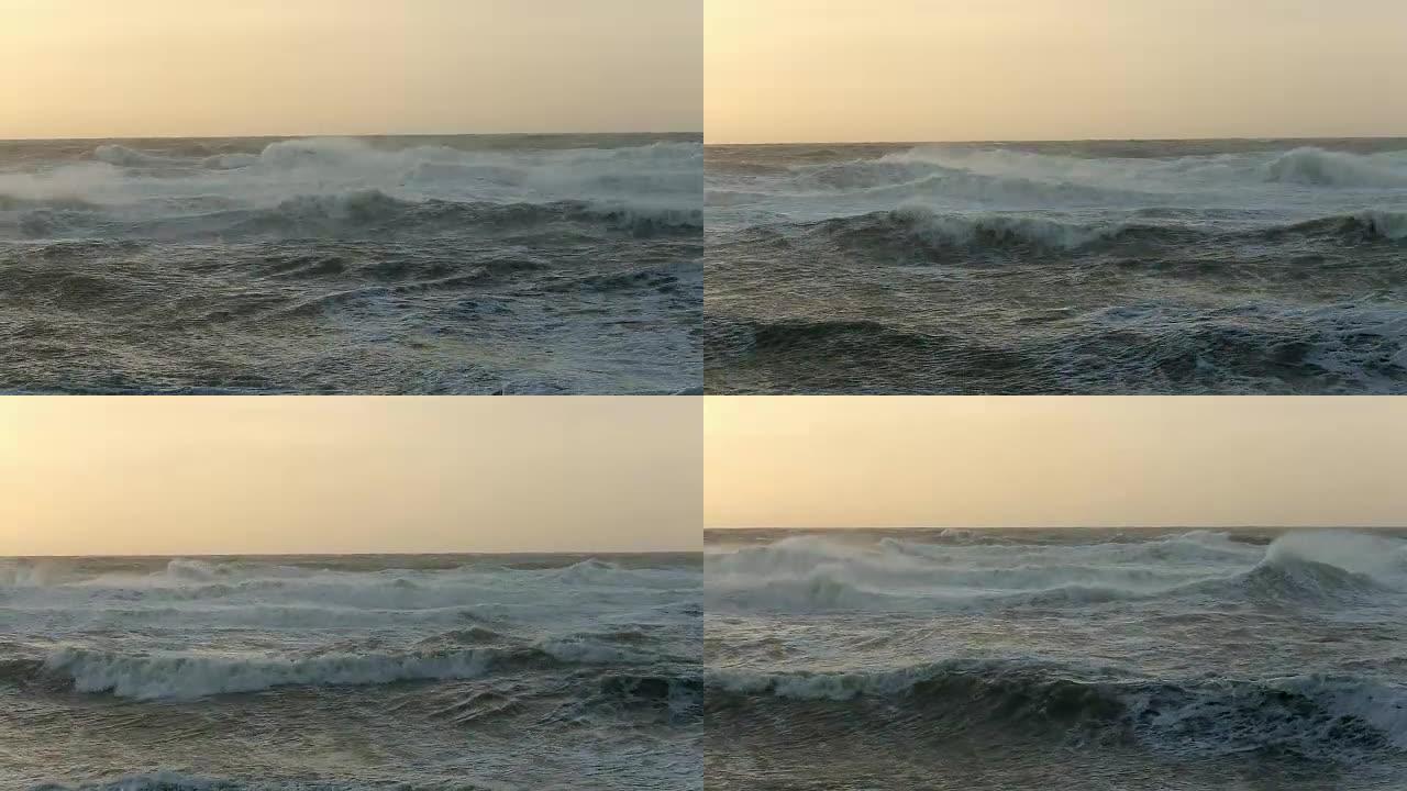 Ocean waves coming up on the shore. Beautiful suns