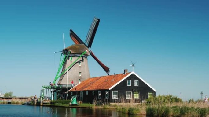 磨坊和老房子是荷兰的典型景观。荷兰的旅游和旅游概念
