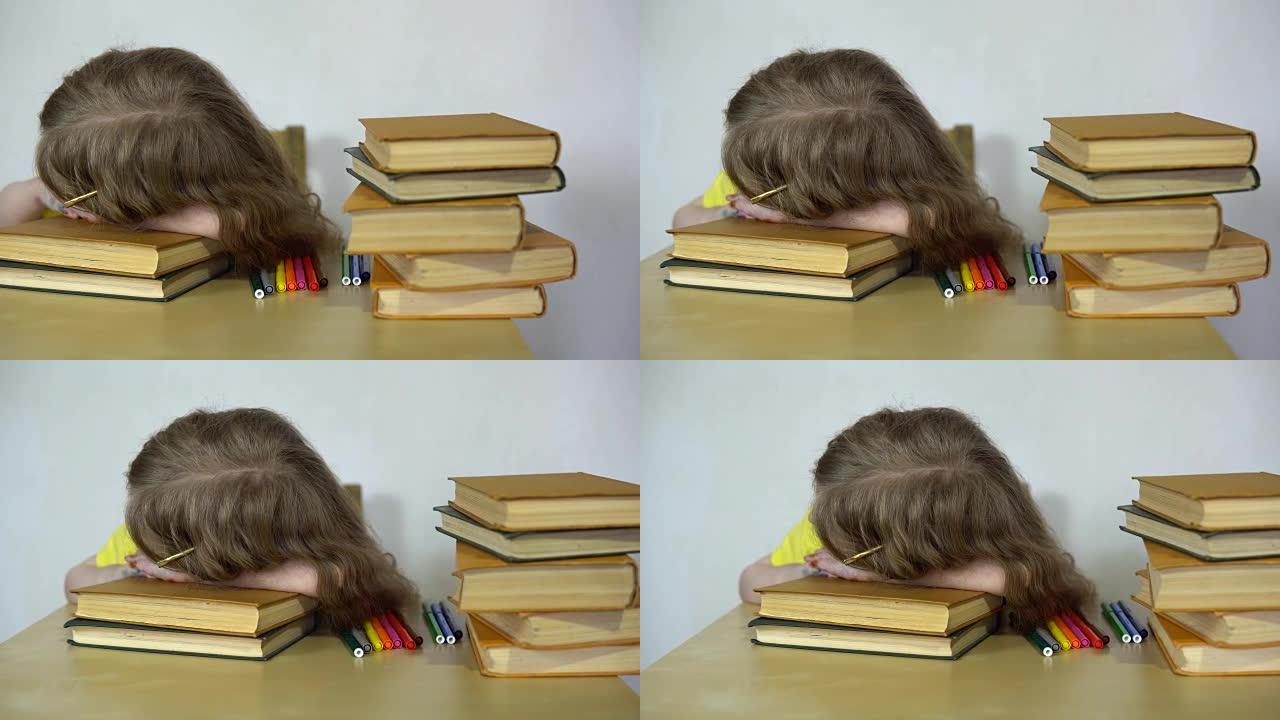 孩子睡在书上，他梦见故事中的人物。