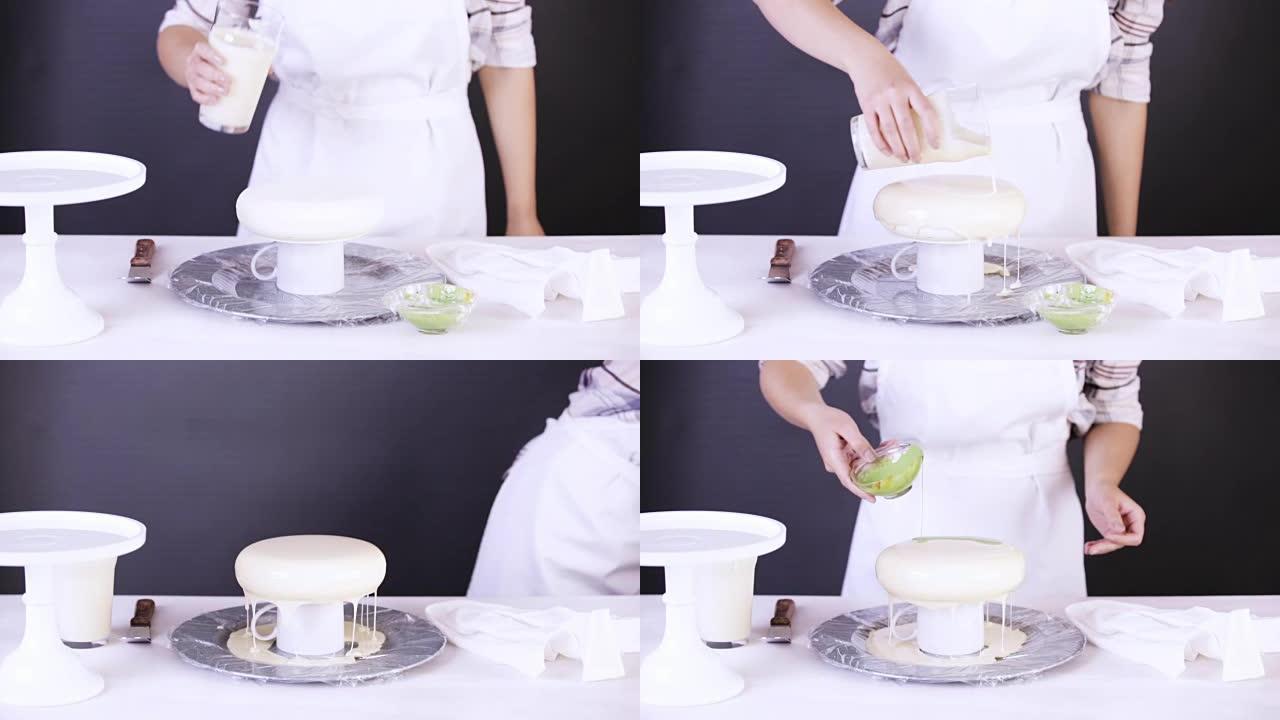 用白色和绿色镜面釉上釉的慕斯蛋糕。