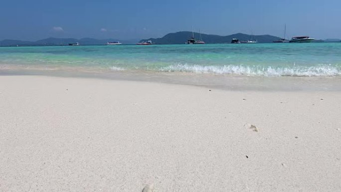 Koh Hey热带海滩沙滩上的海浪