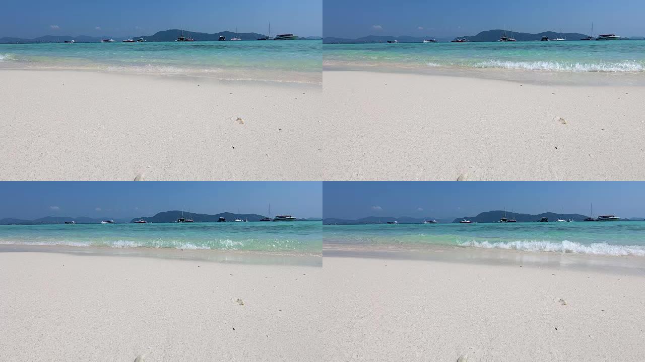 Koh Hey热带海滩沙滩上的海浪