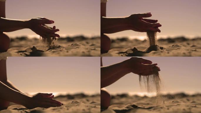日落时手里拿着沙子
