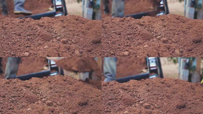 慢动作: 妇女为种植植物制作凹槽