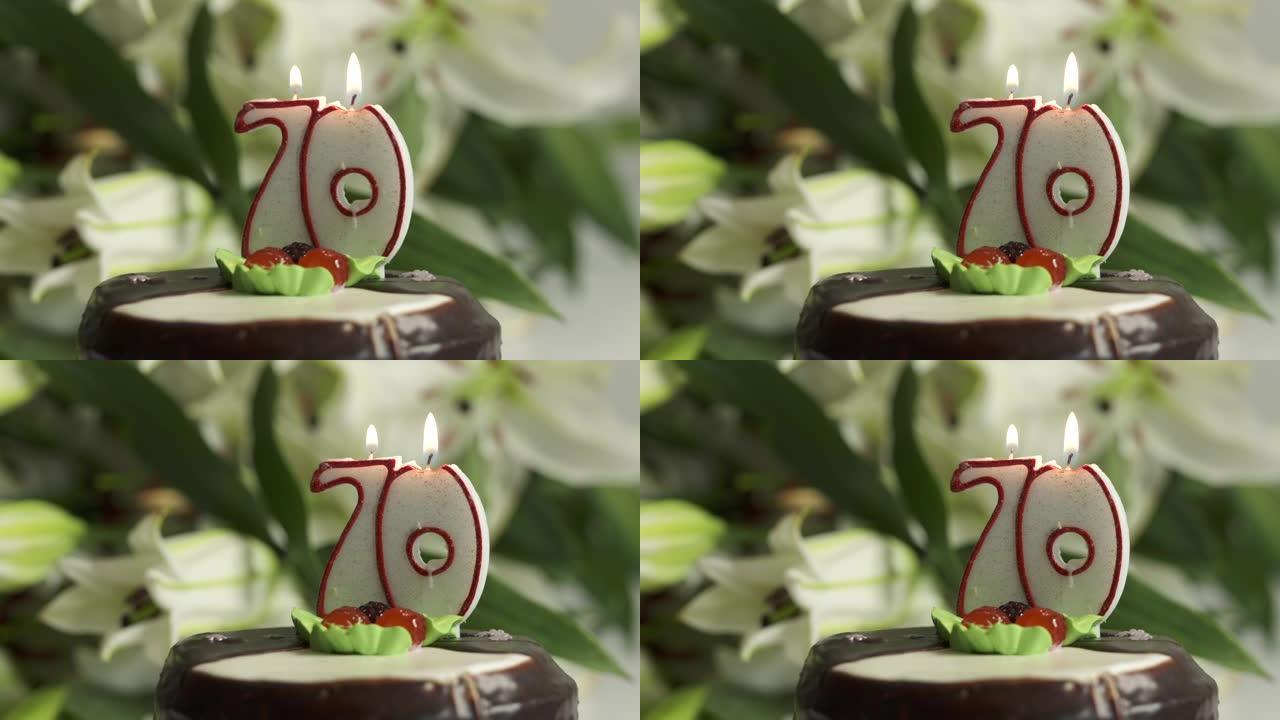 白色百合花束和巧克力蛋糕，蜡烛编号70