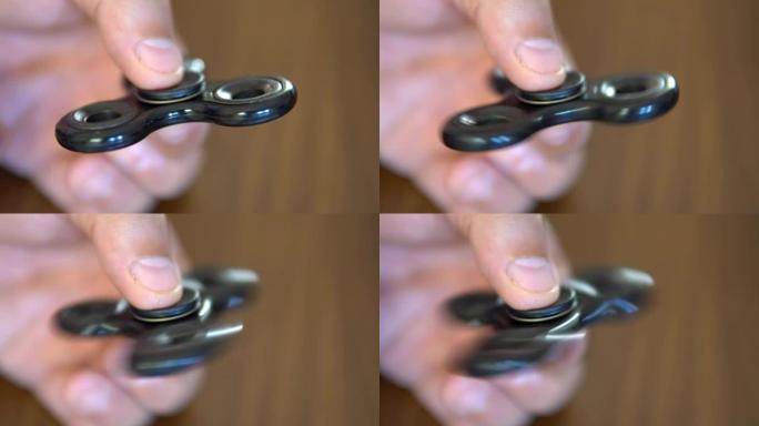 玩烦躁的人。Fidget spinner是一种玩具，据报道可以减轻压力并帮助患有ADD (注意力缺陷