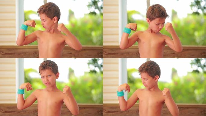 男孩展示他的肌肉