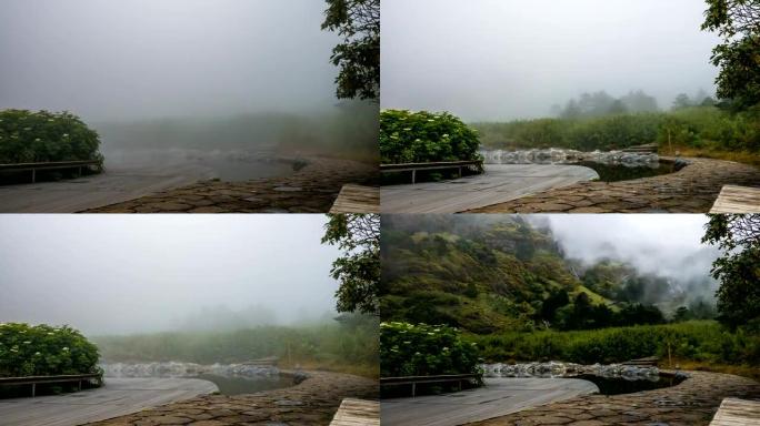 雾在中国热带山区的视点上流动，延时视频