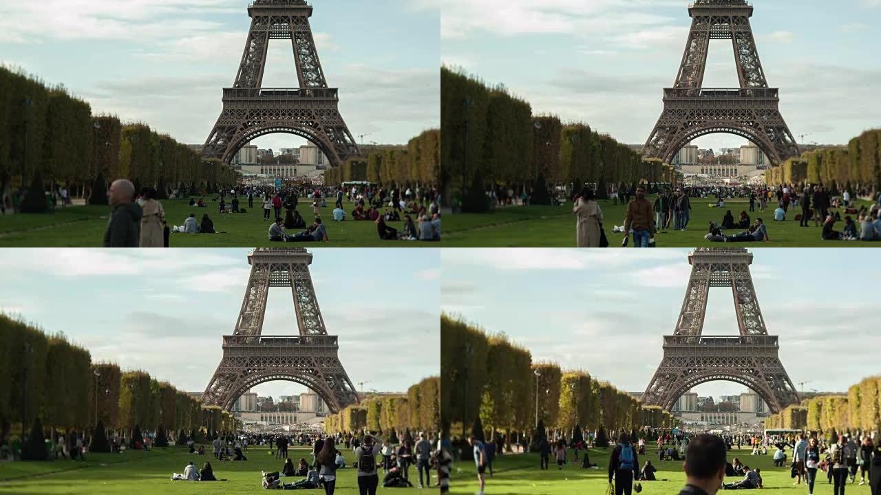 在法国巴黎的Champ de Mars的绿色草坪上，人们的时光倒流