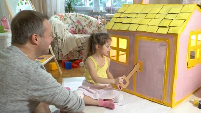 Father gives happy little girl a key to her new ca