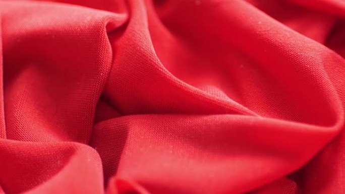红色缎面织物背景，慢动作