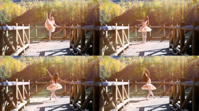 美丽的芭蕾舞演员在秋天的湖边的木制码头上跳舞