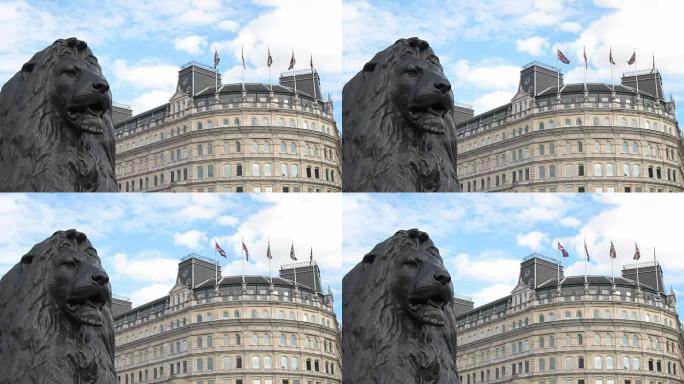 近距离观察伦敦特拉法加广场纳尔逊纪念柱上的青铜狮子