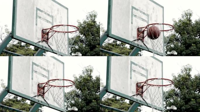 慢动作: 篮球穿过篮筐