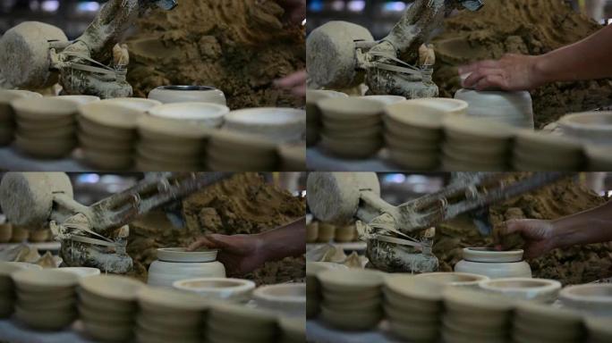 制造工艺碗陶瓷的工人。