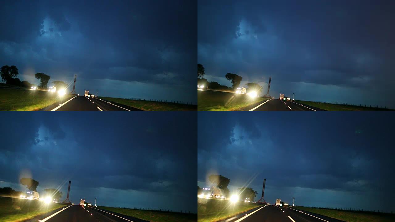 在高速公路上行驶时雷暴袭来。在4k路上的暴风雨之夜