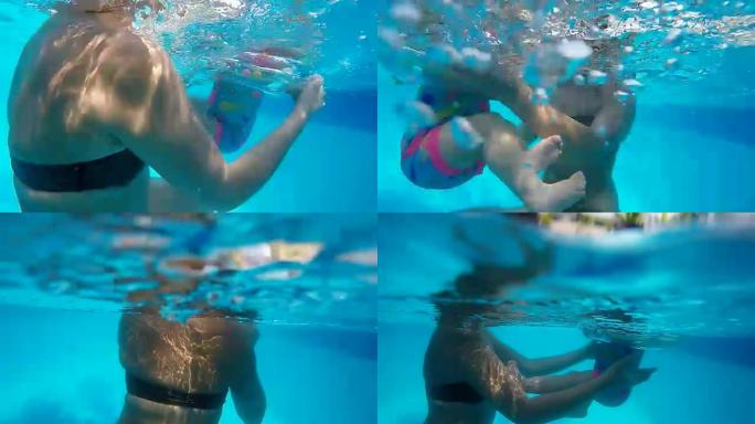 Underwater video of mother playing with baby on su