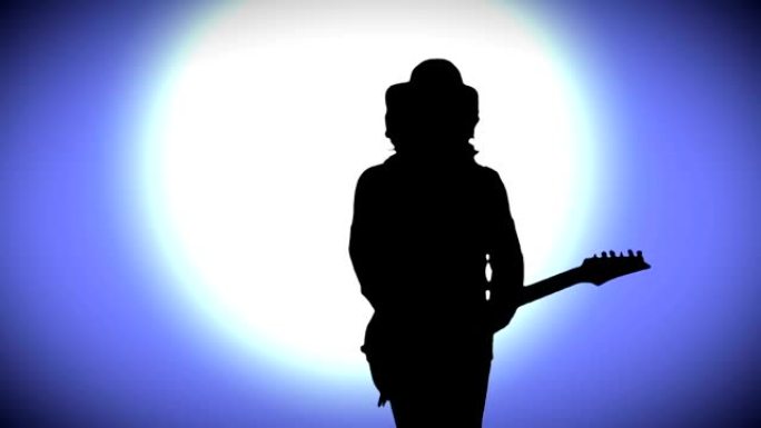 帽子里的酷摇滚吉他手在蓝色背景上用发光的圆圈弹奏电吉他