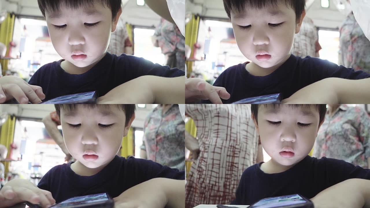 亚洲婴儿手表和游戏智能手机