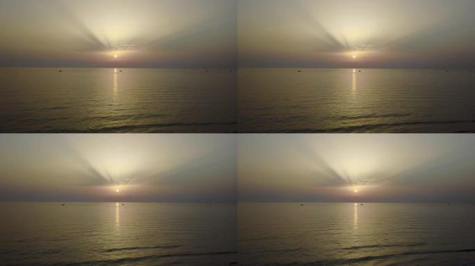 无人机鸟瞰渔船在日出时拉网。亚得里亚海成本。艾米莉亚·罗马涅。意大利