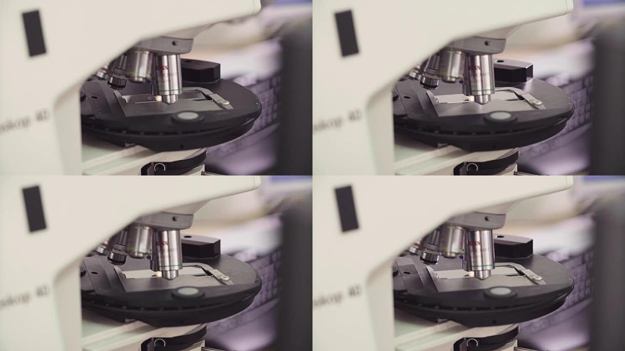 光学显微镜镜头下的滑动玻璃