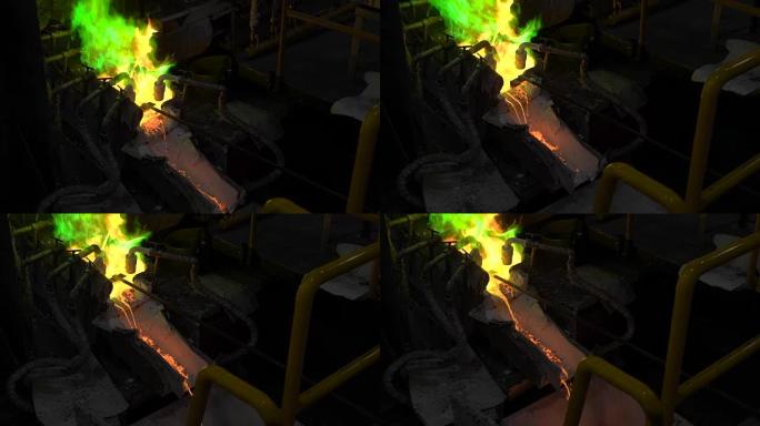 冶金生产。熔融金属从熔炉中倒出，热液体非常危险