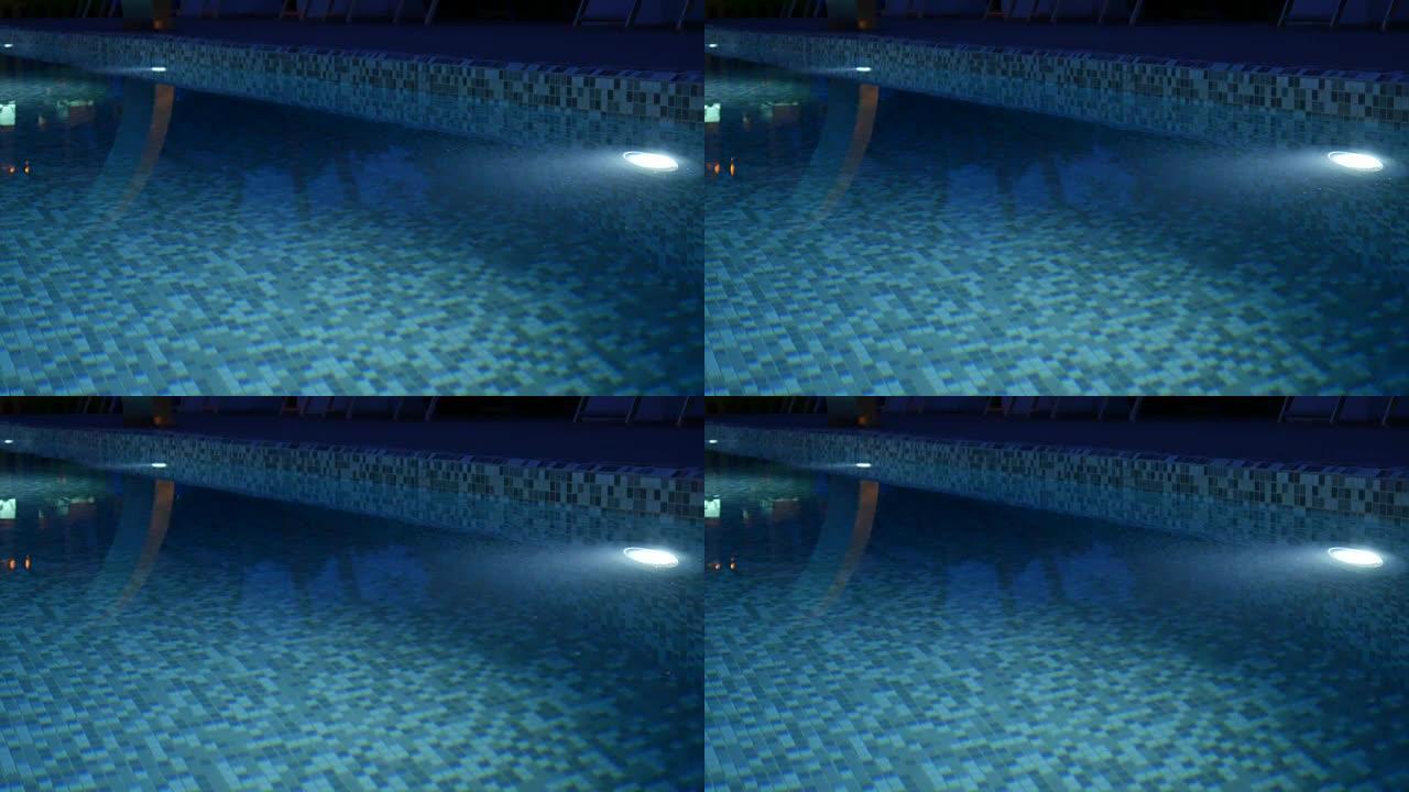 游泳池有夜间照明，可以改变颜色。带冷水的室外酒店游泳池
