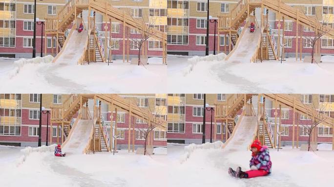 Child is riding slides at playground