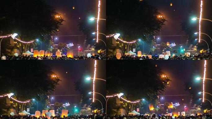 泰国易鹏节，人们在风景桥上放飞灯笼