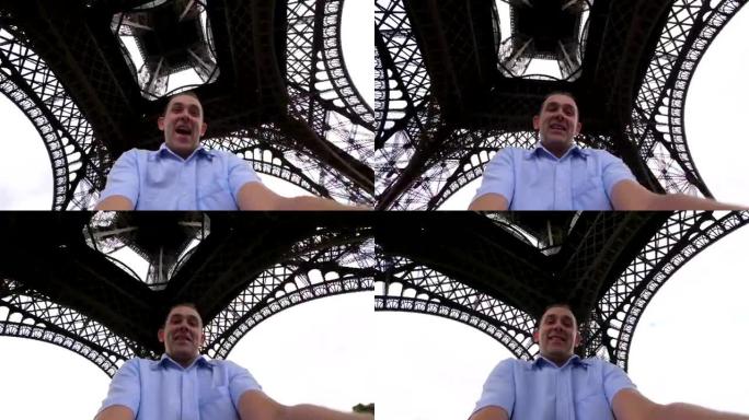 快乐的人在4k慢动作的巴黎埃菲尔铁塔下旋转和玩乐