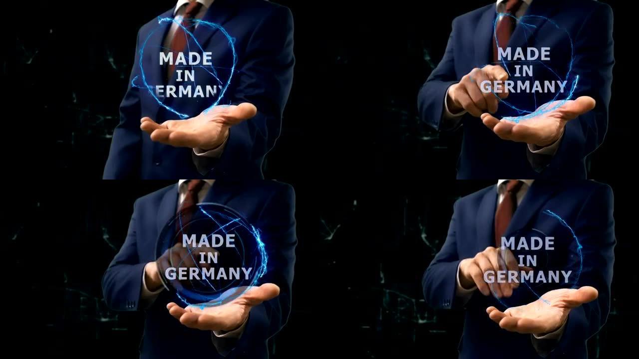 商人在他的手上展示了德国制造的概念全息图