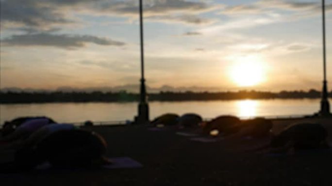 defocus Asian people practicing yoga pose