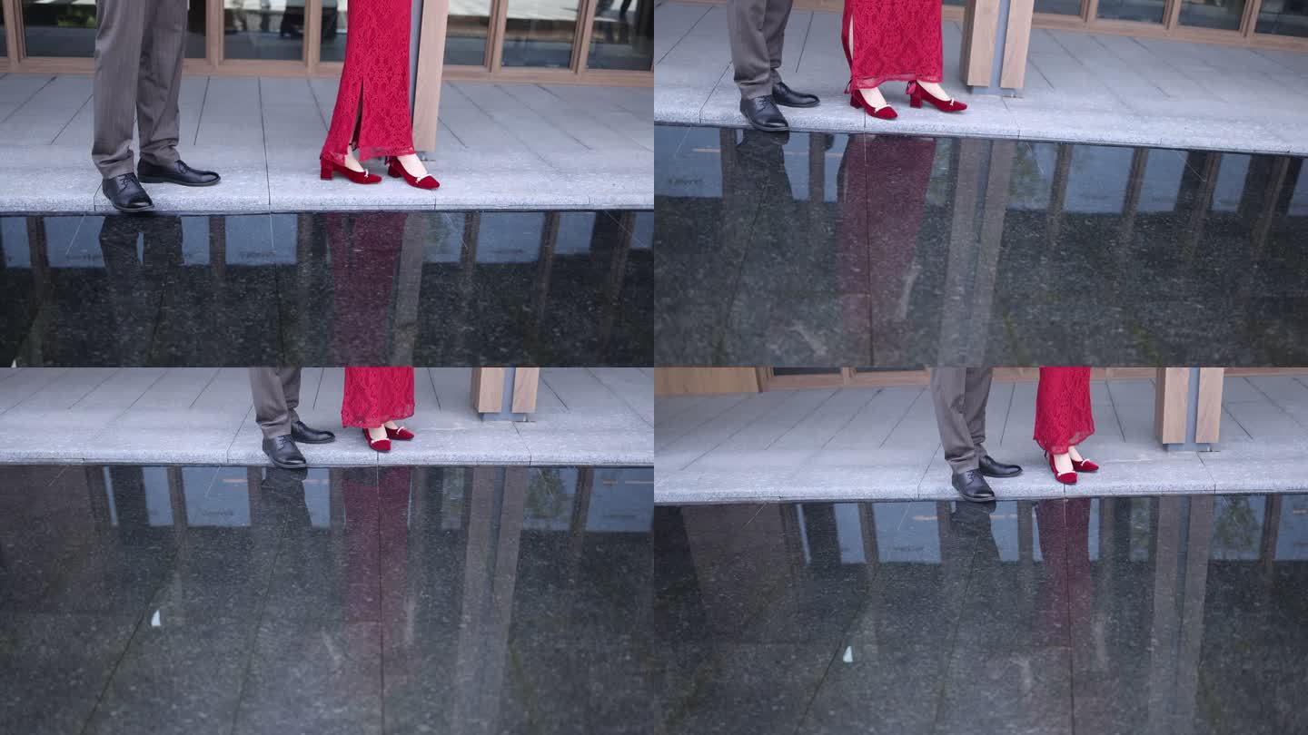 新郎新娘行走拍造型拍摄红色旗袍棕色西服