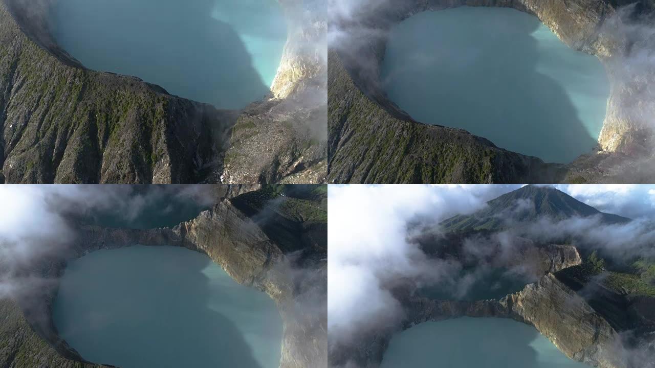 克里木图三彩色火山口布满薄雾清晨鸟瞰图
