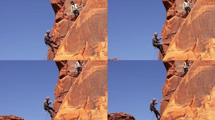 摩押的男性和女性攀岩者