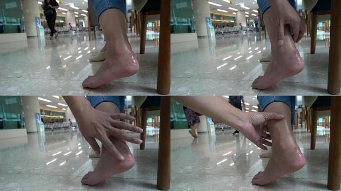 女人脚踝接受理疗。