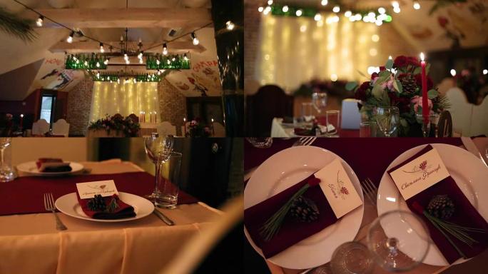 圣诞婚礼宴会厅内部细节汇编，餐厅装饰和餐桌布置。冬季装饰灯泡花环、蜡烛、鲜花、圆锥体和冷杉树枝