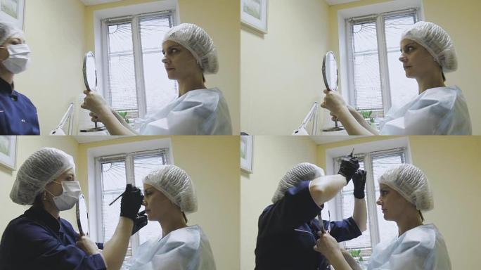 美容诊所的一名女雇员在微喷砂程序之前进行标记