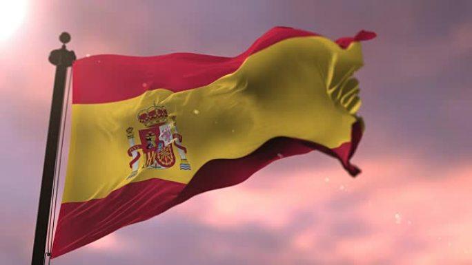 西班牙国旗在日落时以缓慢的循环在风中挥舞