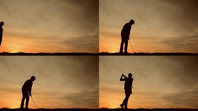 剪影男高尔夫球手正在日落温暖的灯光下打高尔夫球