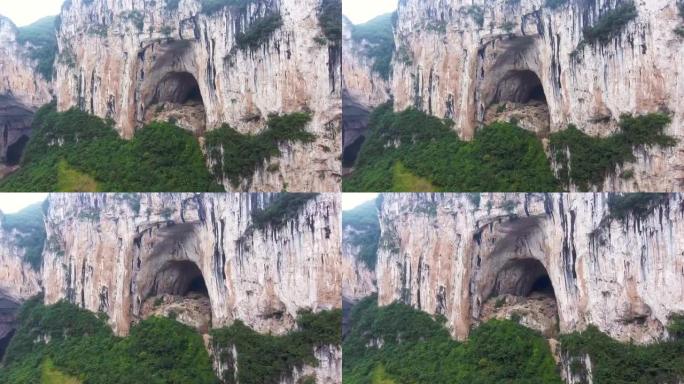 中国贵州省热带山区悬崖大洞穴入口的鸟瞰图