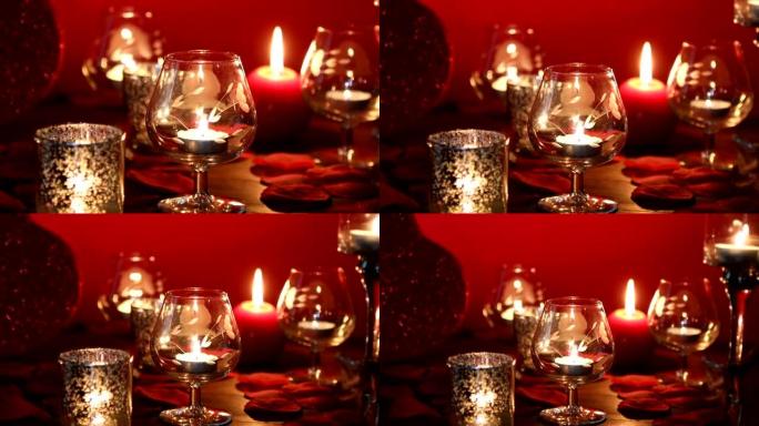 情人节浪漫，红心、蜡烛和玫瑰花瓣。