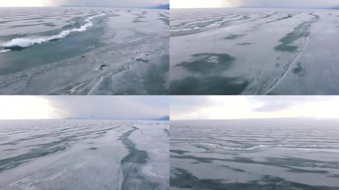 乘直升机飞越冰海或海洋。