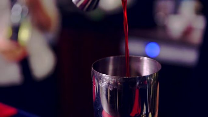 Bartender make cocktail in a bar