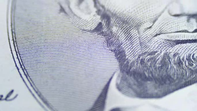 缓慢旋转的亚伯拉罕·林肯头像在五美元纸币上