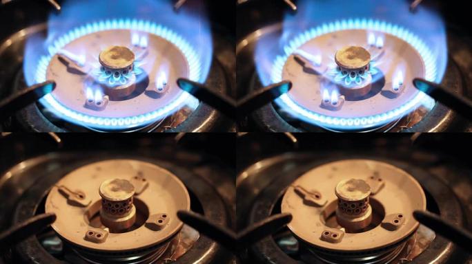 液化石油气燃气灶的蓝色火焰在能量耗尽后熄灭