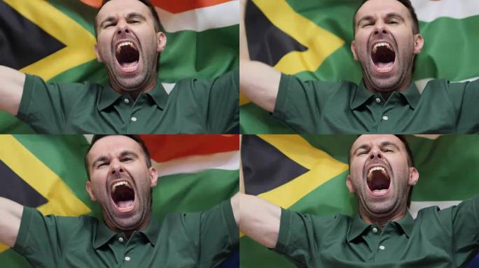 南非球迷庆祝举着南非国旗慢动作，4k，高品质